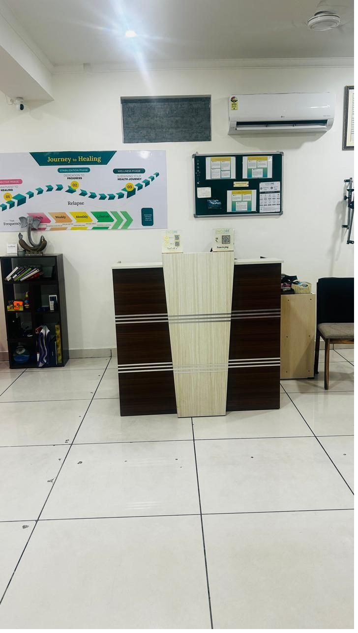 Encore front desk and Journey to Healing wall